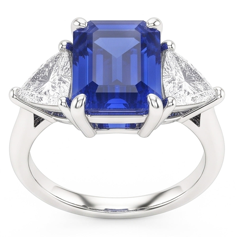 Anello con tre pietre di zaffiro blu. smeraldo e trilioni di diamanti 2.50 carati