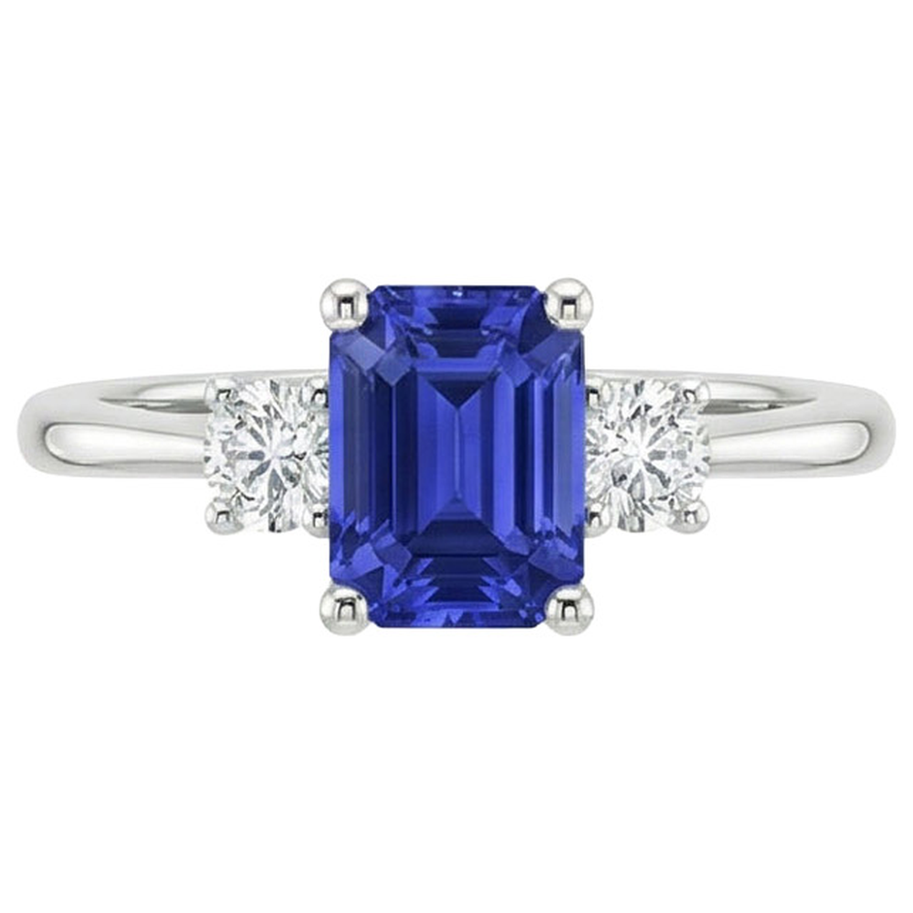Anello con tre pietre preziose. diamante rotondo e zaffiro di Ceylon 3.50 carati