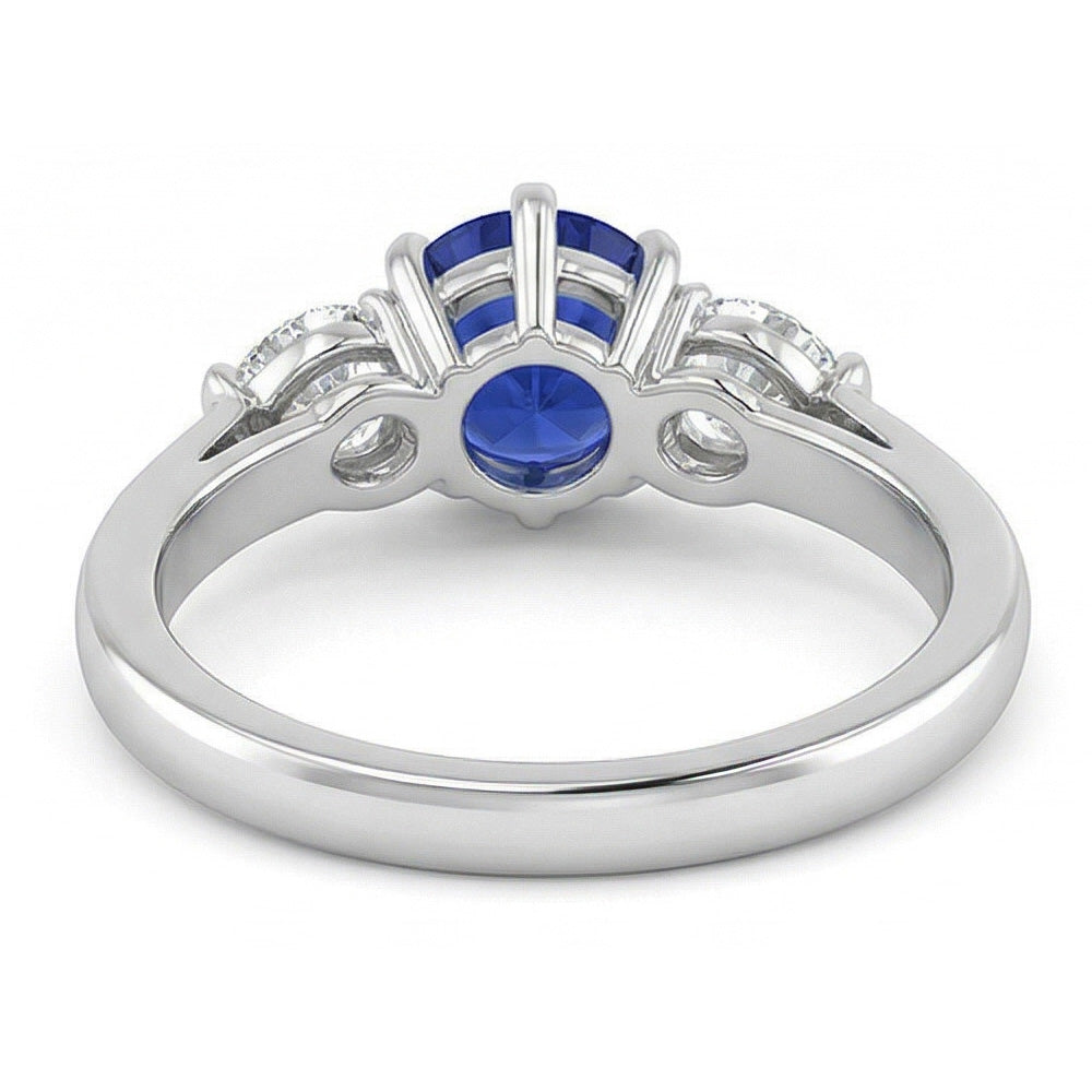 Anello con tre pietre tonde di zaffiro blu e diamanti a forma di pera 1,25 carati con Oro Bianco 14K