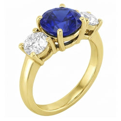 Anello con zaffiri blu 5 carati e diamanti con tre pietre tonde
