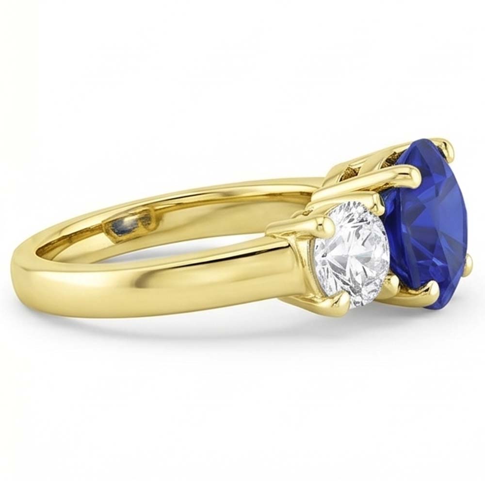 Anello con zaffiri blu 5 carati e diamanti con tre pietre tonde