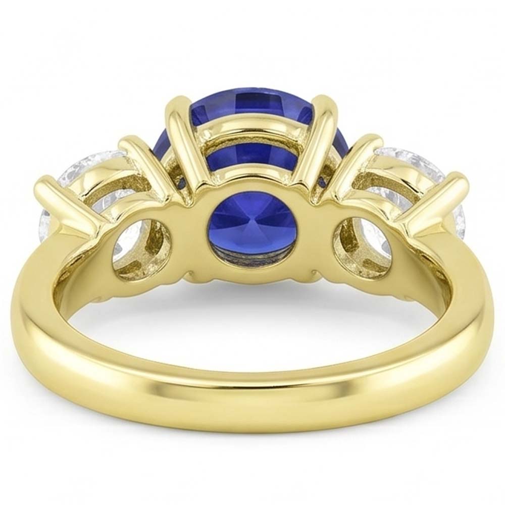 Anello con zaffiri blu 5 carati e diamanti con tre pietre tonde
