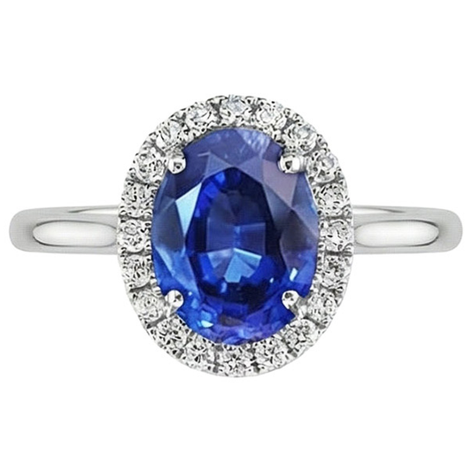 Anello con zaffiro Ceylon ovale 3 carati e diamanti in oro bianco 14K