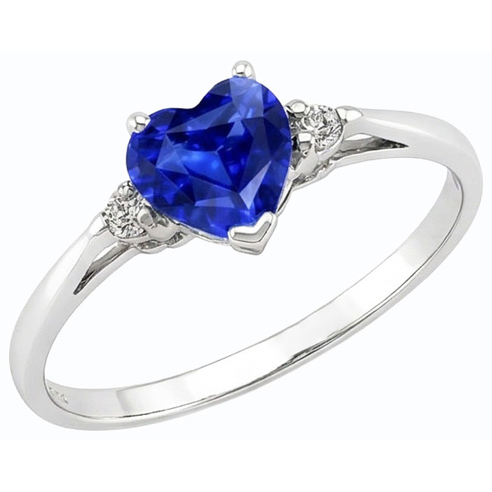 Anello con zaffiro a cuore da 1,75 carati dello Sri Lanka e tre pietre di diamanti tondi