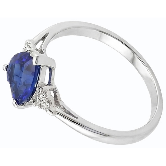 Anello con zaffiro a cuore da 1,75 carati dello Sri Lanka e tre pietre di diamanti tondi