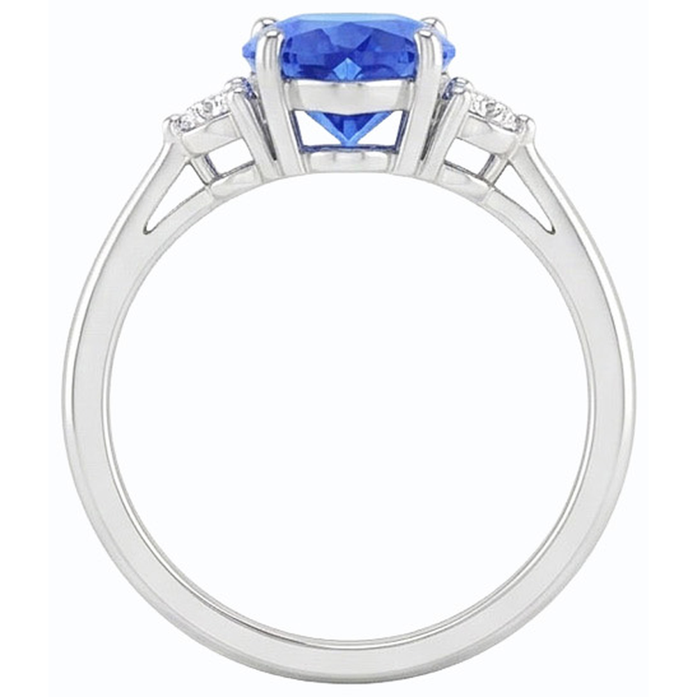 Anello con zaffiro a cuore da 1,75 carati dello Sri Lanka e tre pietre di diamanti tondi