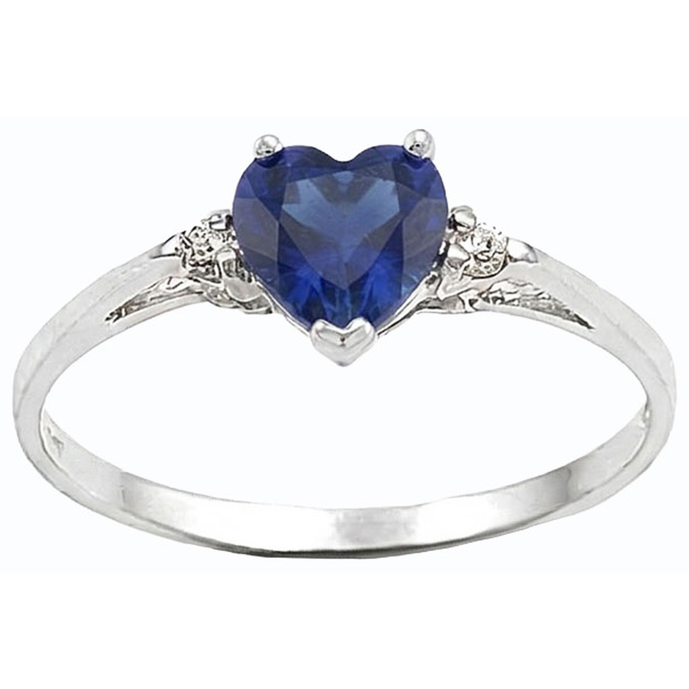 Anello con zaffiro a cuore da 1,75 carati dello Sri Lanka e tre pietre di diamanti tondi