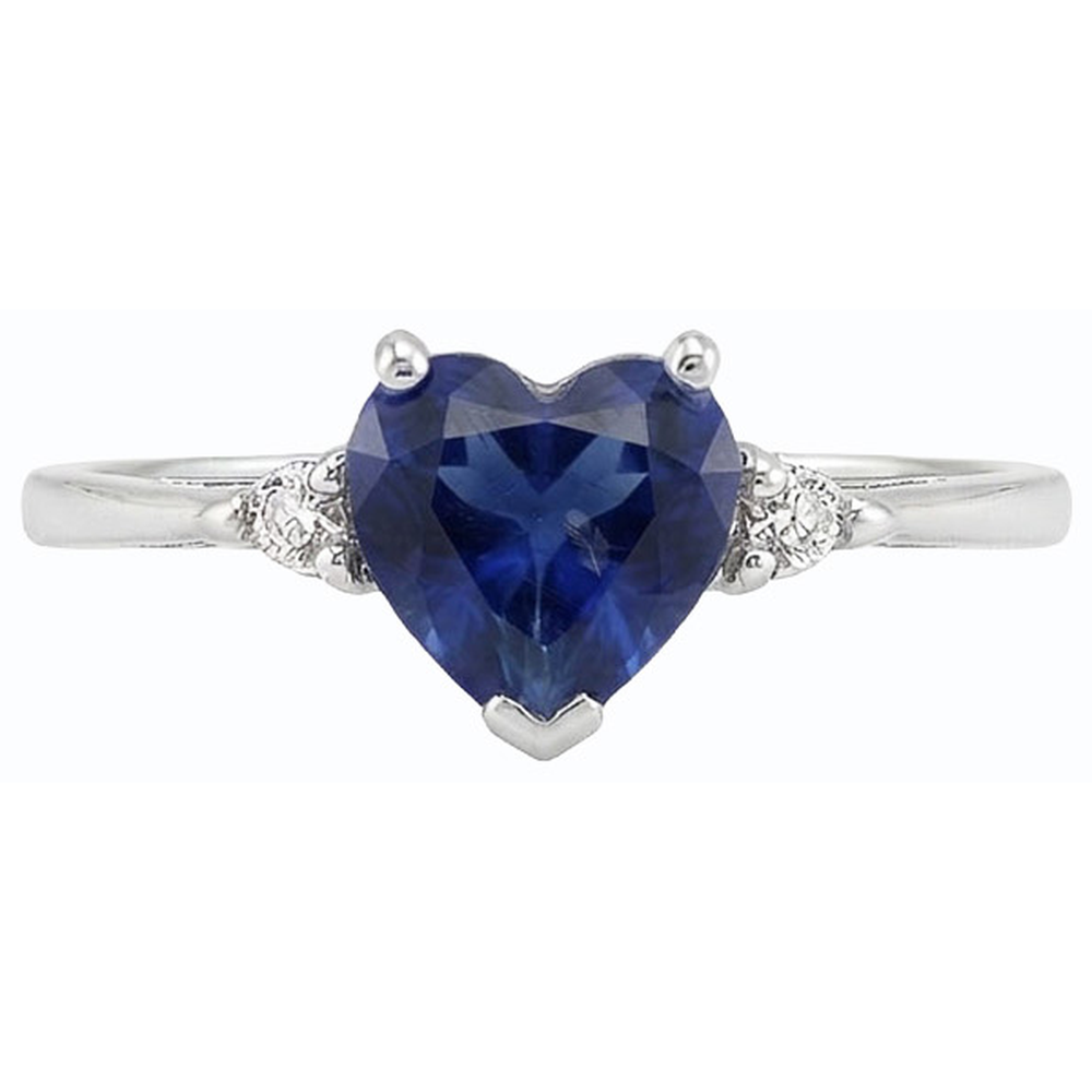 Anello con zaffiro a cuore da 1,75 carati dello Sri Lanka e tre pietre di diamanti tondi
