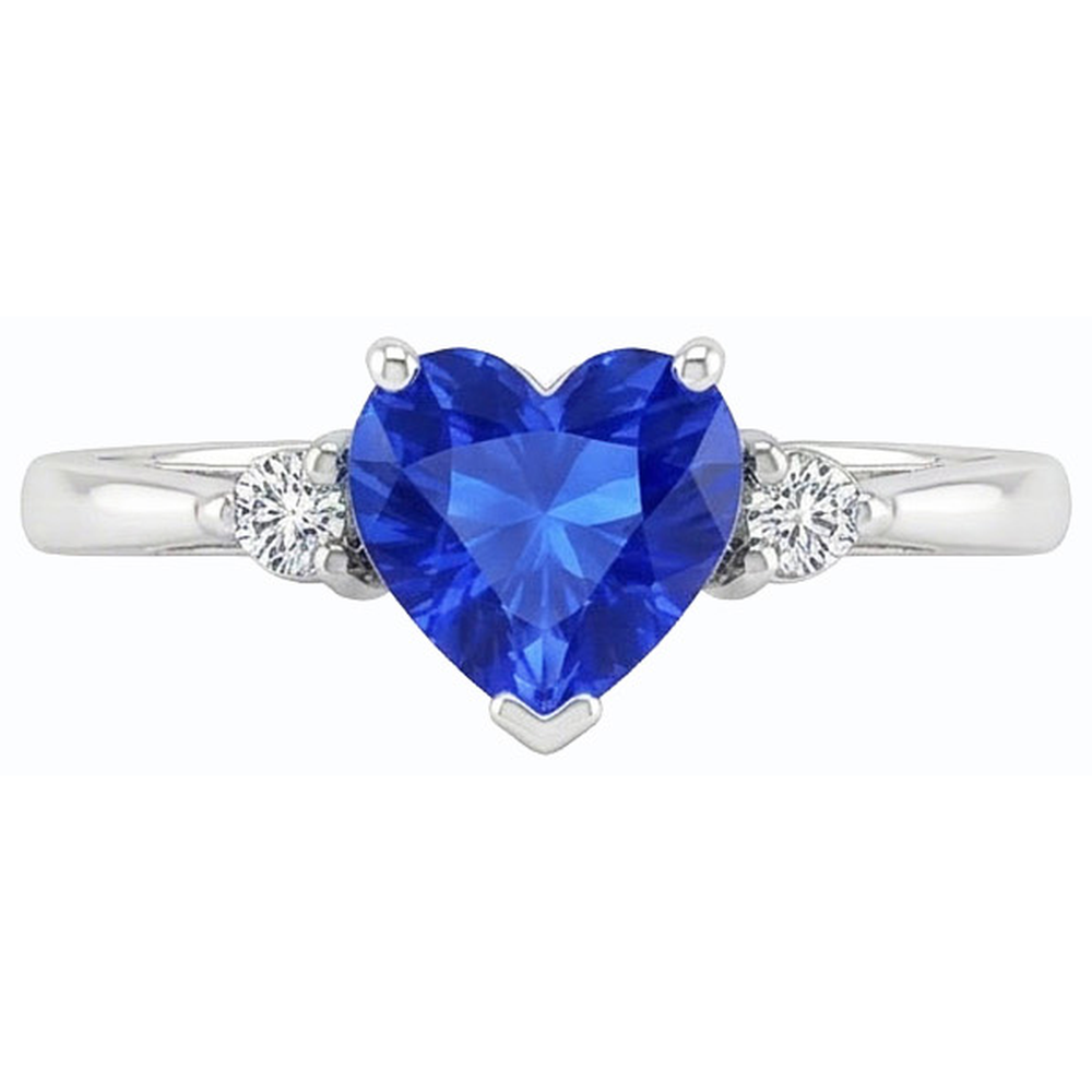 Anello con zaffiro a cuore da 1,75 carati dello Sri Lanka e tre pietre di diamanti tondi
