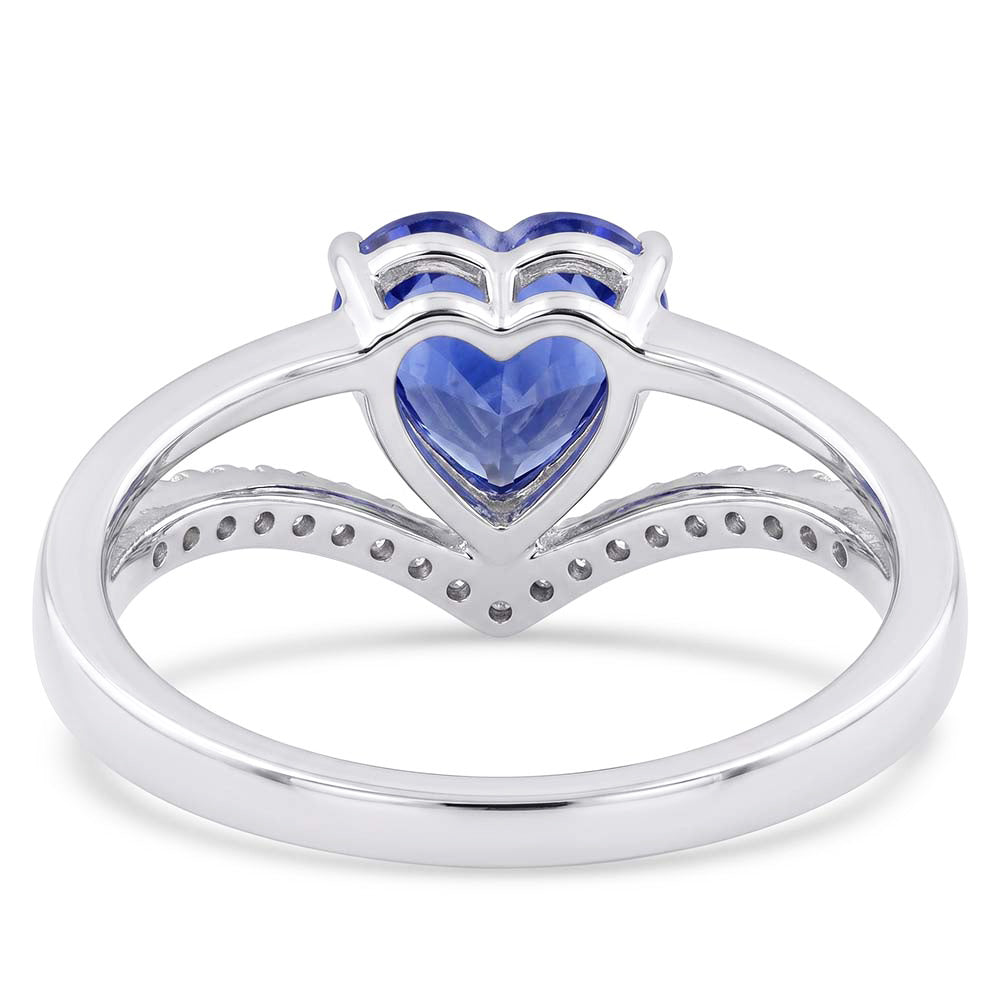 Anello con zaffiro azzurro a forma di cuore con diamanti. oro 2 carati. 14K