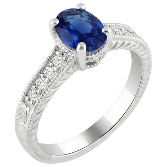 Anello con zaffiro blu 1,85 carati e diamante taglio ovale in oro bianco 14K