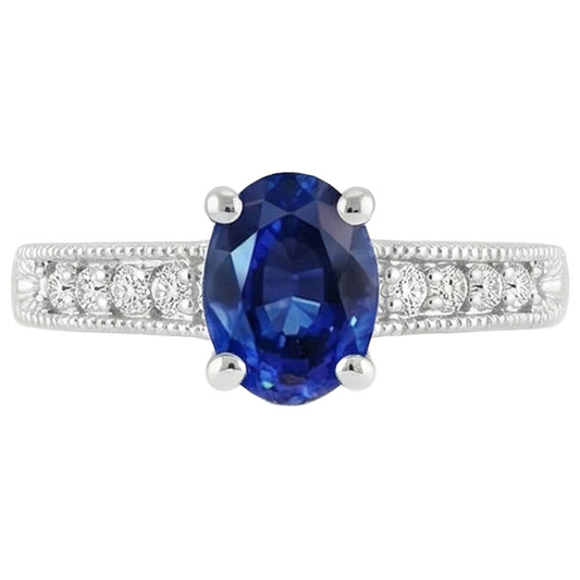 Anello con zaffiro blu 1,85 carati e diamante taglio ovale in oro bianco 14K