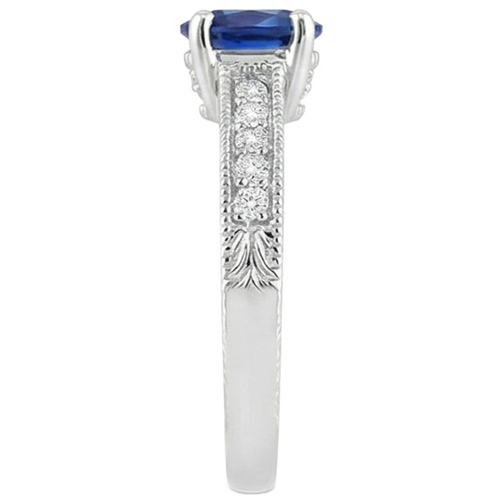 Anello con zaffiro blu 1,85 carati e diamante taglio ovale in oro bianco 14K