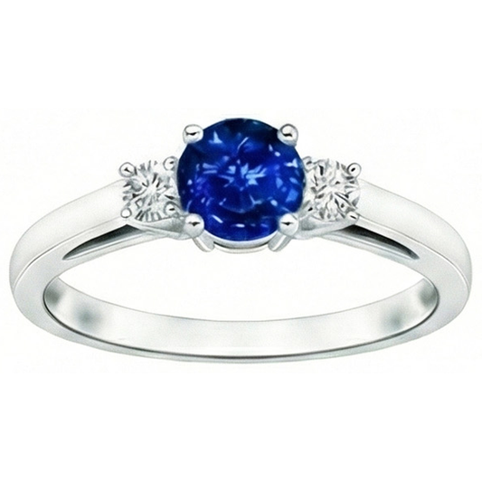 Anello con zaffiro blu 2,70 carati e diamanti tre pietre in oro bianco 14K