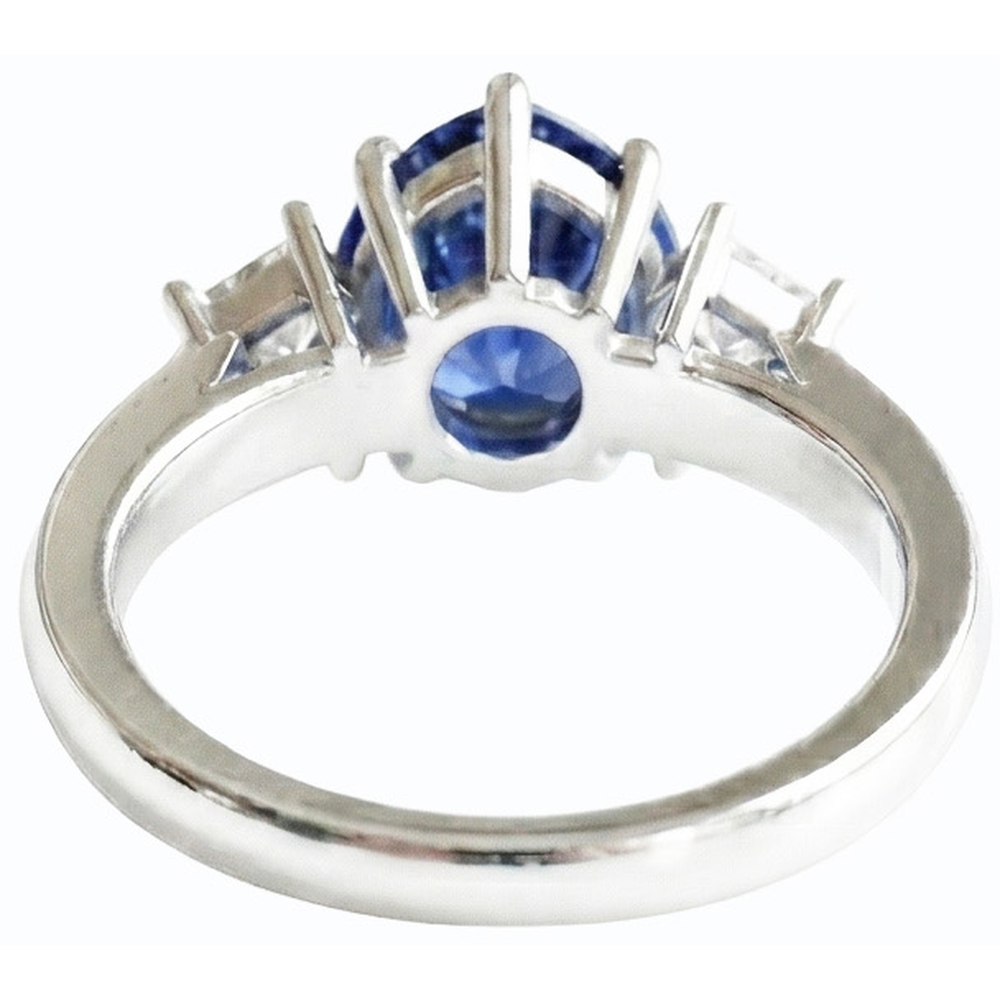 Anello con zaffiro blu a forma di pera 3 carati e diamanti princess 3 pietre in oro 14K