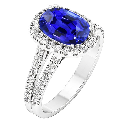 Anello con zaffiro blu a forma ovale con diamante a gambo diviso 5 carati