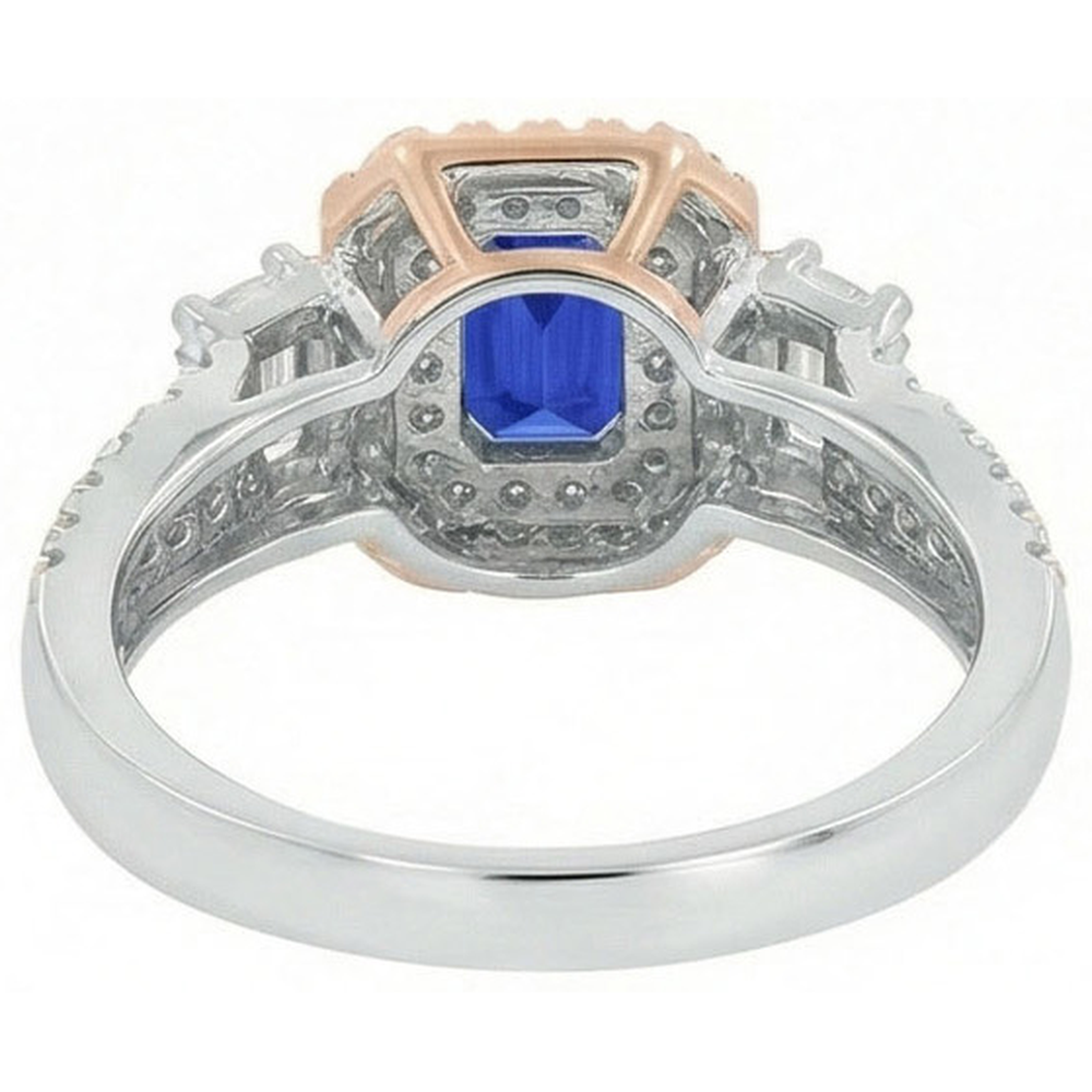 Anello con zaffiro blu bicolore doppio alone con smeraldo e diamanti 4 carati