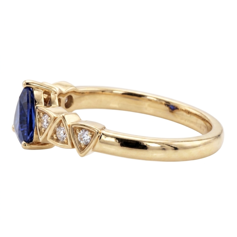 Anello con zaffiro blu e diamante rotondo a forma di trilione 0.75 carati