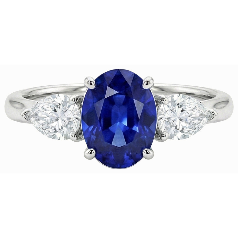 Anello con zaffiro blu profondo 3 carati e diamanti a forma di pera tre pietre ovali