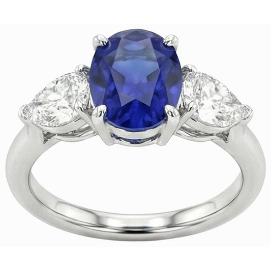 Anello con zaffiro blu profondo 3 carati e diamanti a forma di pera tre pietre ovali