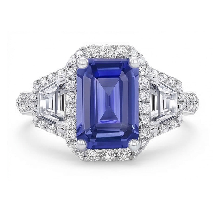 Anello con zaffiro blu smeraldo Halo 4.50 carati trapezoidale e diamanti rotondi