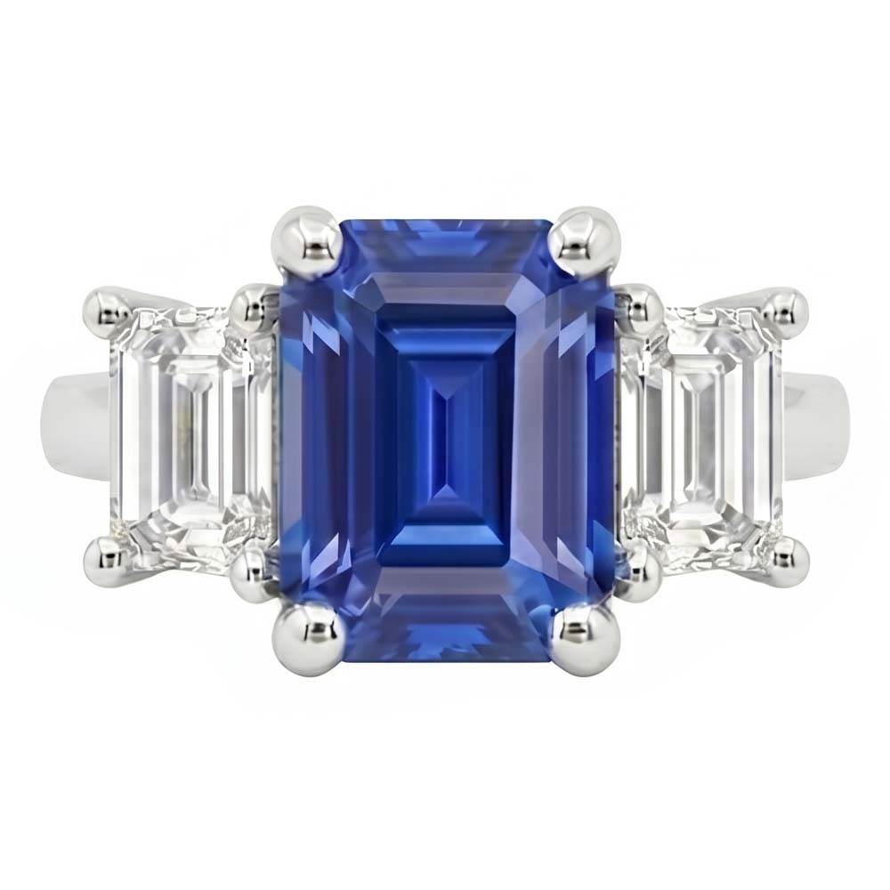 Anello con zaffiro blu smeraldo da 2,50 carati e diamanti tre pietre