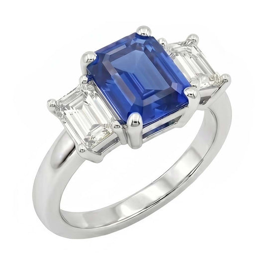 Anello con zaffiro blu smeraldo da 2,50 carati e diamanti tre pietre