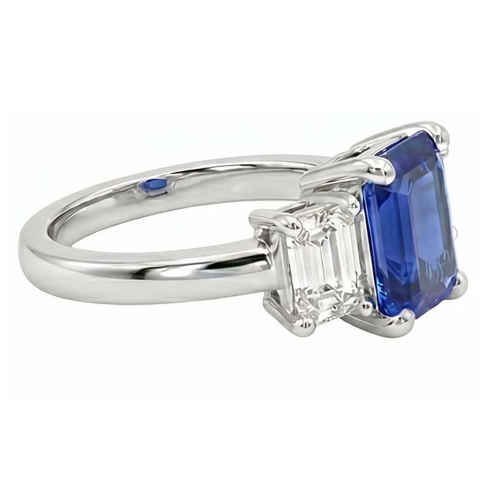 Anello con zaffiro blu smeraldo da 2,50 carati e diamanti tre pietre