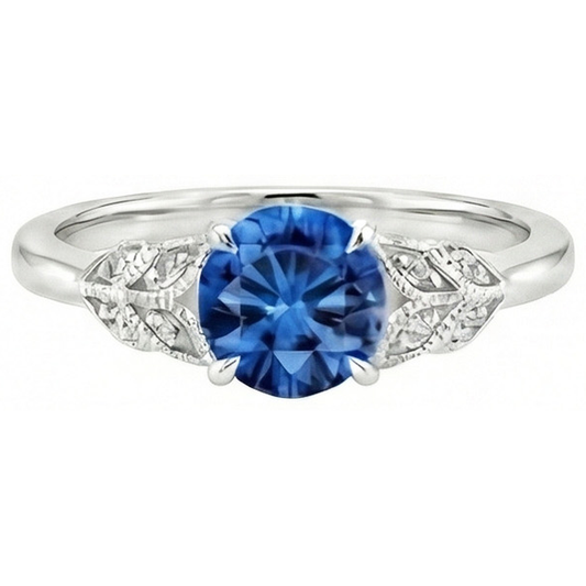Anello con zaffiro blu taglio rotondo da 2,25 carati e diamanti in oro bianco 14K