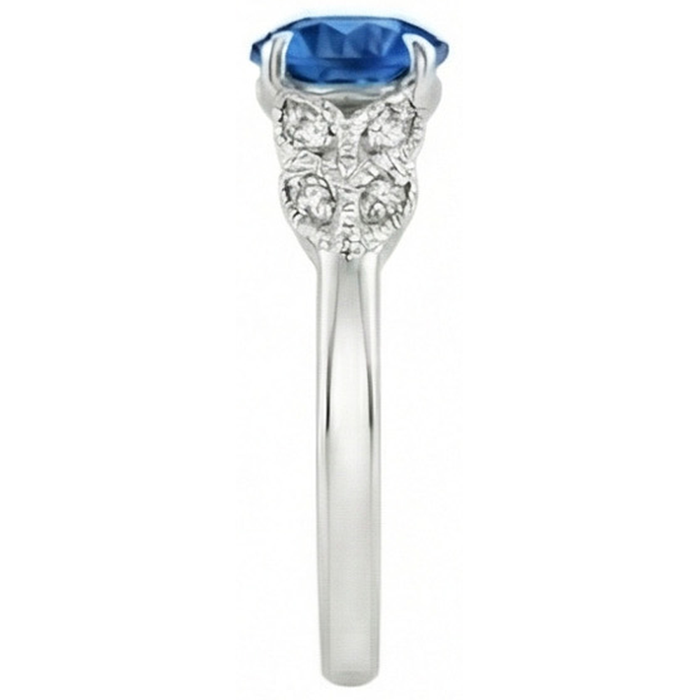 Anello con zaffiro blu taglio rotondo da 2,25 carati e diamanti in oro bianco 14K