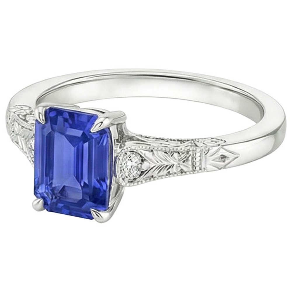 Anello con zaffiro blu taglio smeraldo da 3,25 carati e 3 pietre di diamanti
