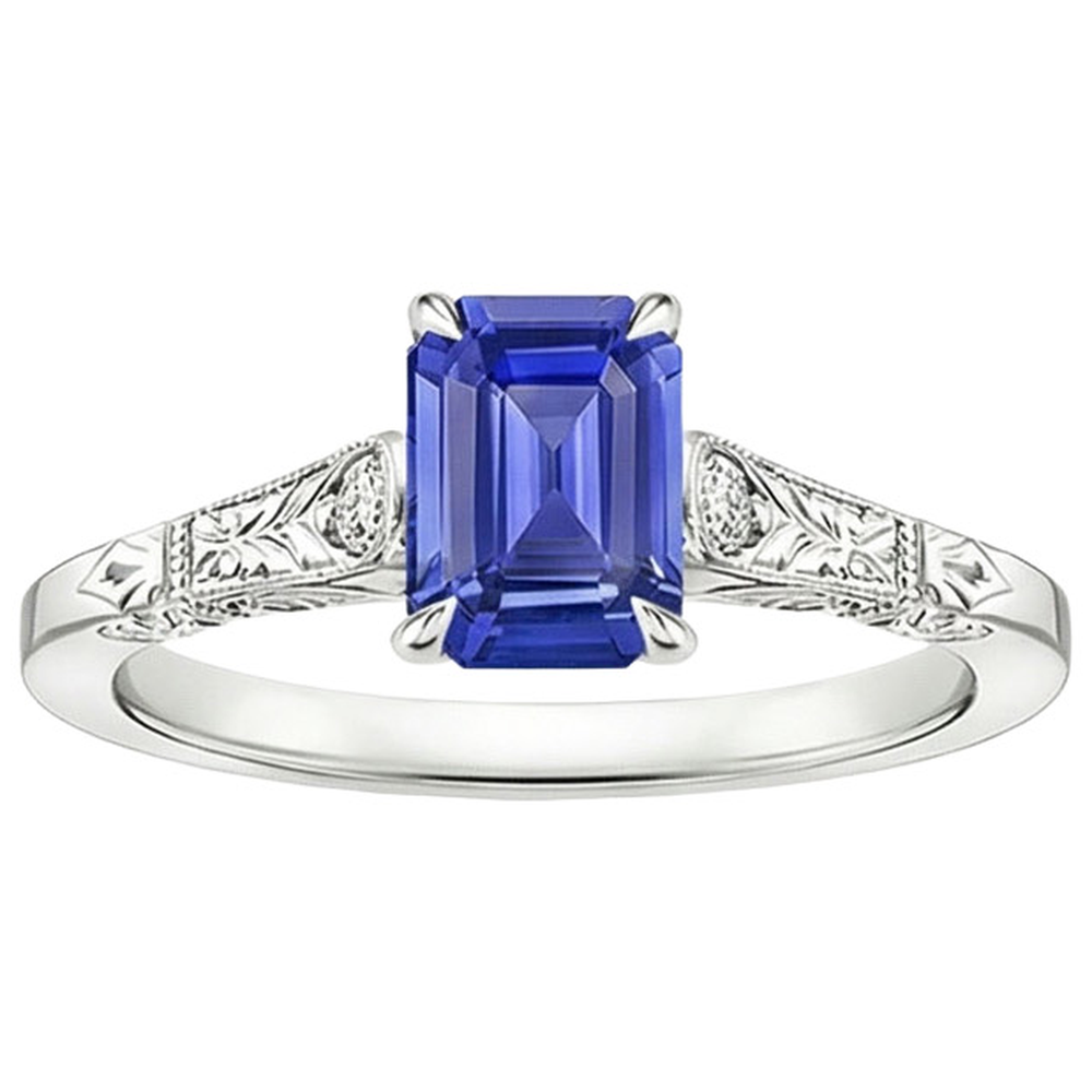 Anello con zaffiro blu taglio smeraldo da 3,25 carati e 3 pietre di diamanti