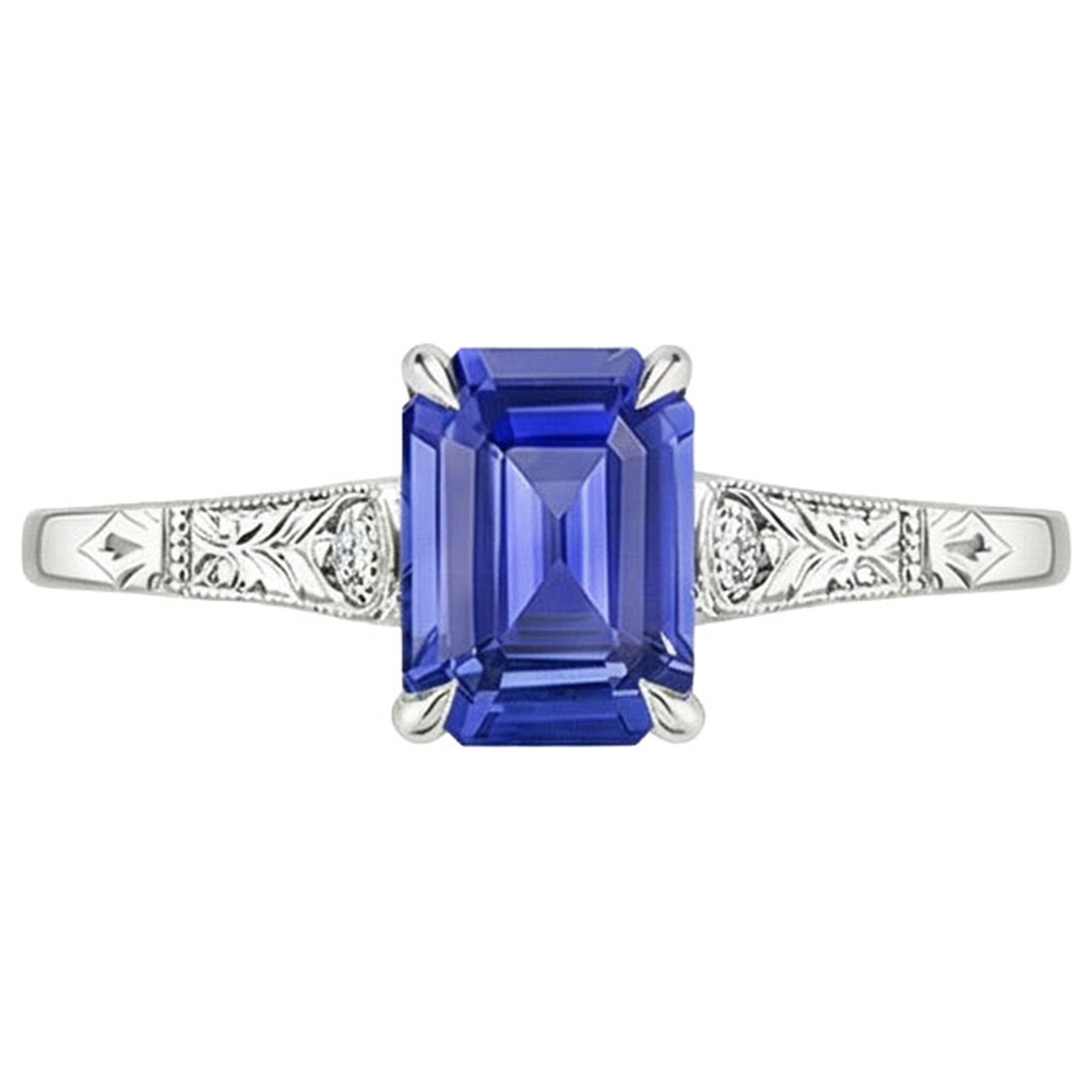 Anello con zaffiro blu taglio smeraldo da 3,25 carati e 3 pietre di diamanti