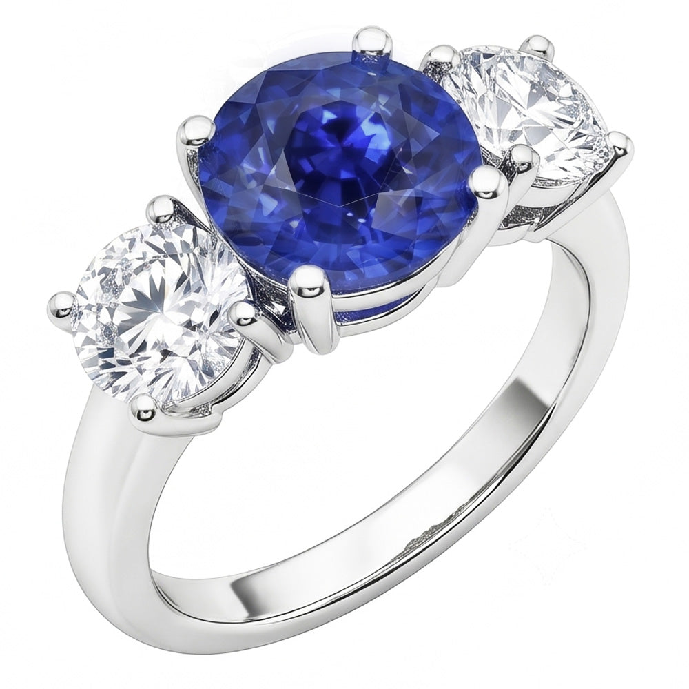 Anello con zaffiro blu tondo da 2,50 carati e diamanti tre pietre in oro bianco 14K