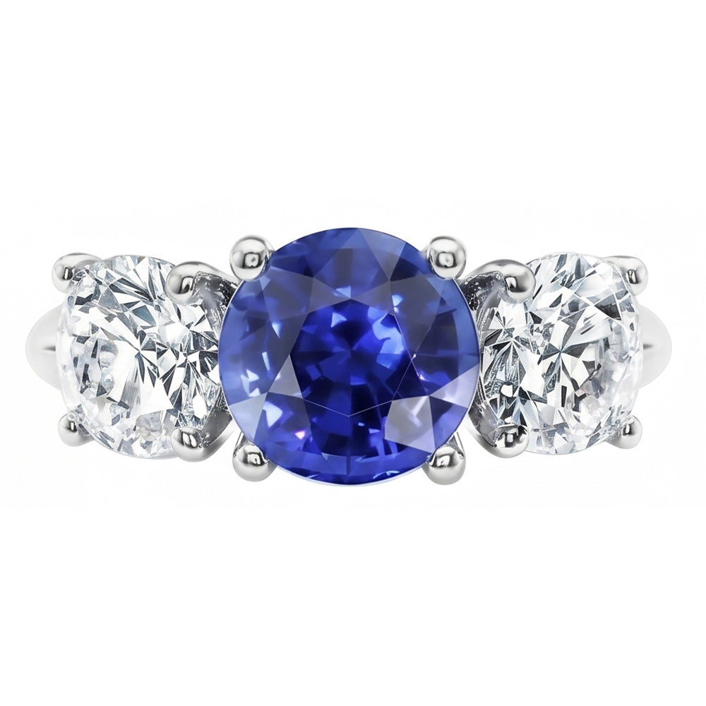 Anello con zaffiro blu tondo da 2,50 carati e diamanti tre pietre in oro bianco 14K