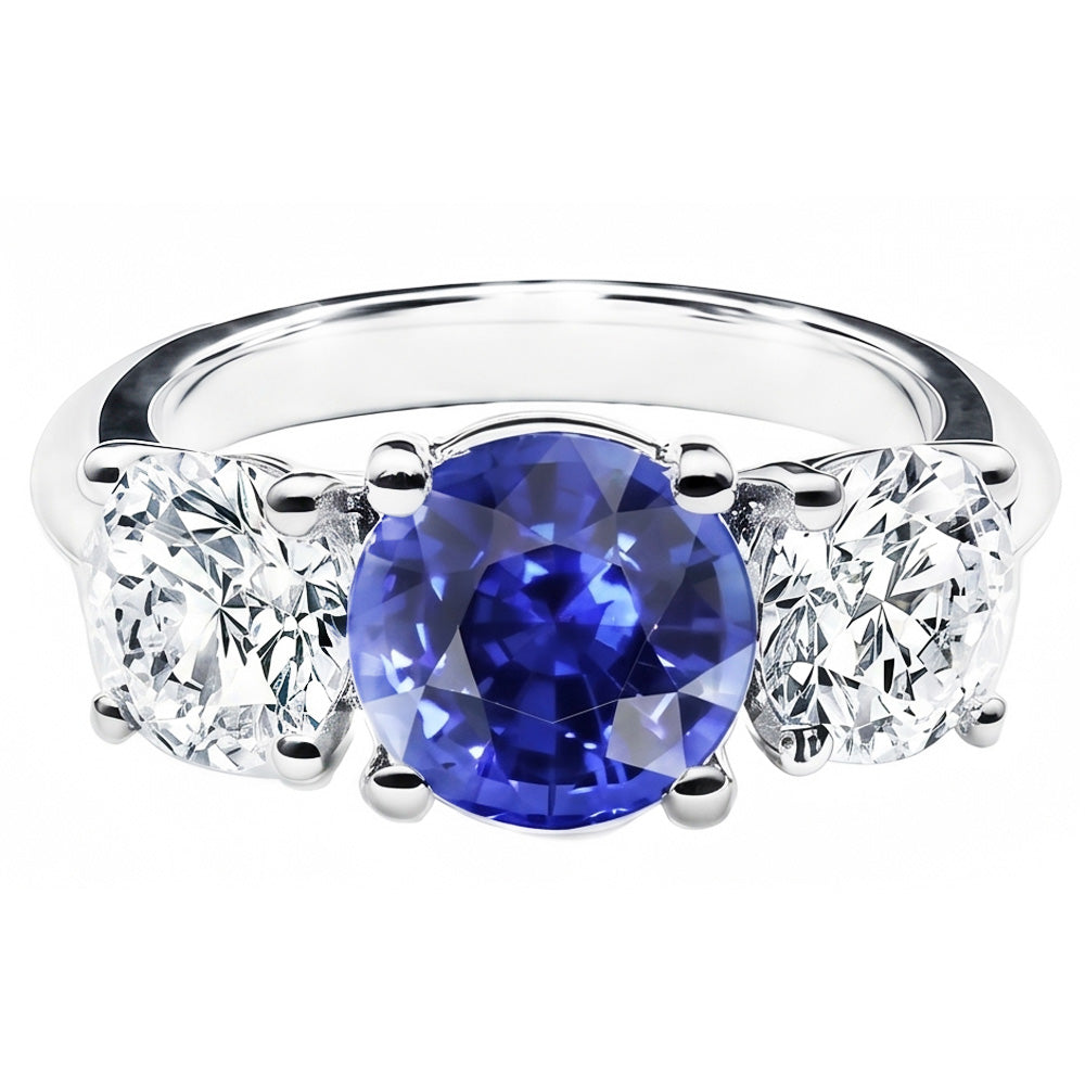 Anello con zaffiro blu tondo da 2,50 carati e diamanti tre pietre in oro bianco 14K