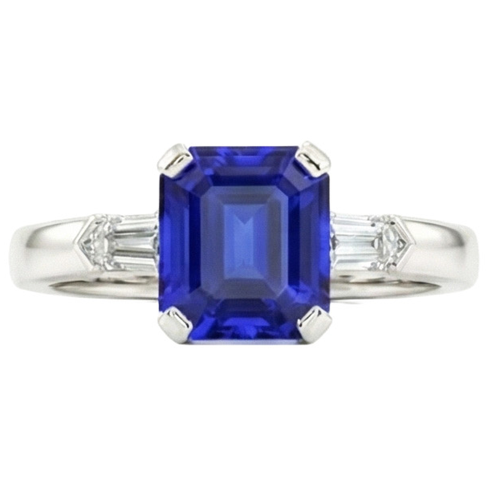 Anello con zaffiro e smeraldo con 3 pietre e diamanti. 1.75 carati. baguette affusolate