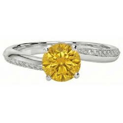 Anello con zaffiro giallo a taglio rotondo da 3.50 ct con incastonatura a griffe con diamanti