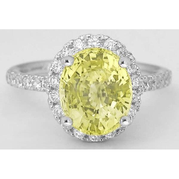 Anello con zaffiro giallo ovale e diamante rotondo in oro bianco 3.5 ct. - harrychadent.it