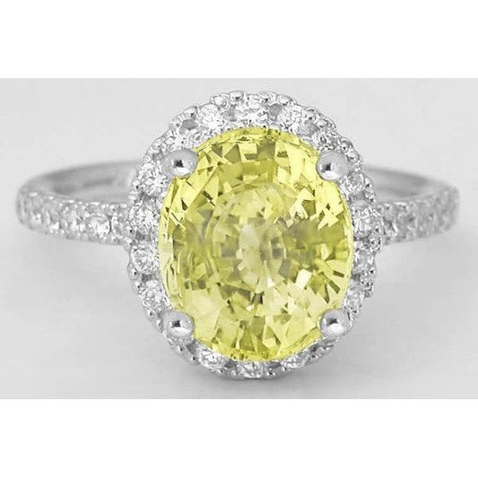 Anello con zaffiro giallo ovale e diamante rotondo in oro bianco 3.5 ct. - harrychadent.it