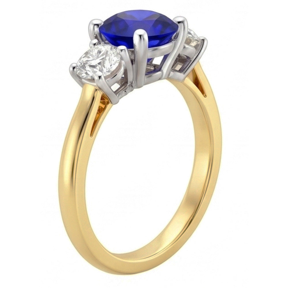Anello con zaffiro tondo da 2,50 carati e tre pietre in oro bicolore 14K