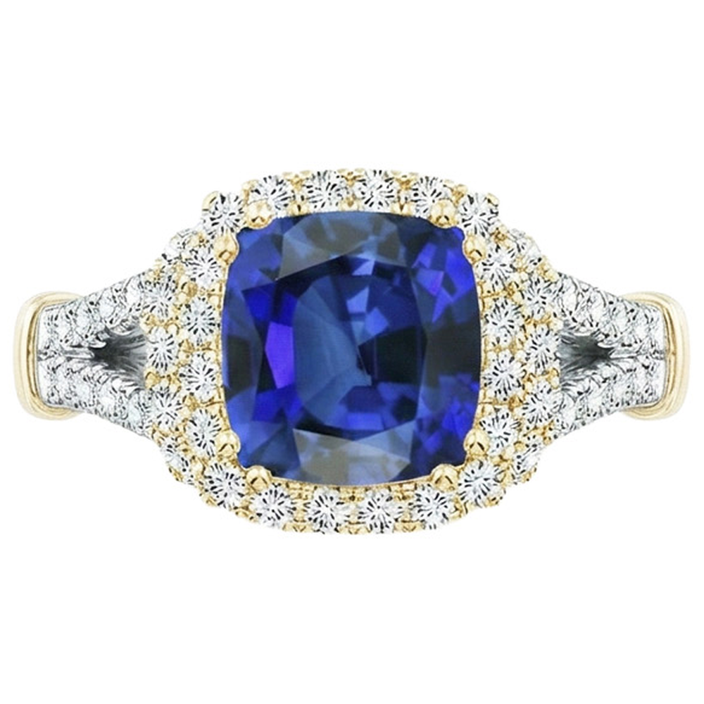 Anello da donna con diamante bicolore. cuscino. zaffiro blu. oro 14 carati. 3.25 carati