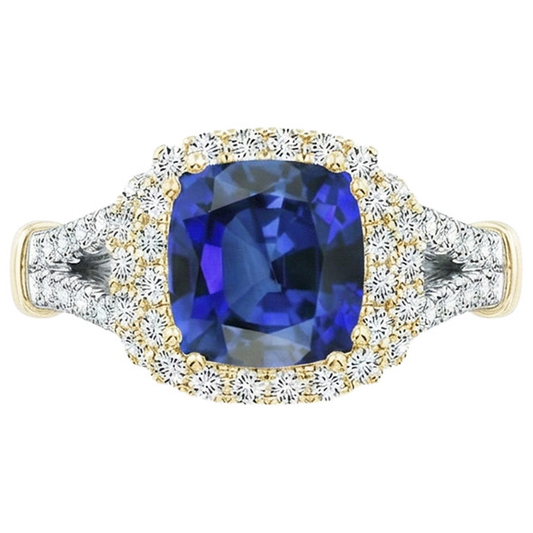 Anello da donna con diamante bicolore. cuscino. zaffiro blu. oro 14 carati. 3.25 carati