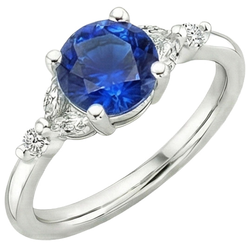 Anello da donna con pietre preziose. zaffiro blu marquise e diamanti rotondi 3 carati