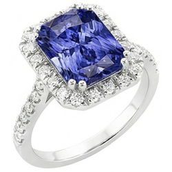 Anello da donna con zaffiro blu intenso Halo Radiante e diamanti 3.50 carati
