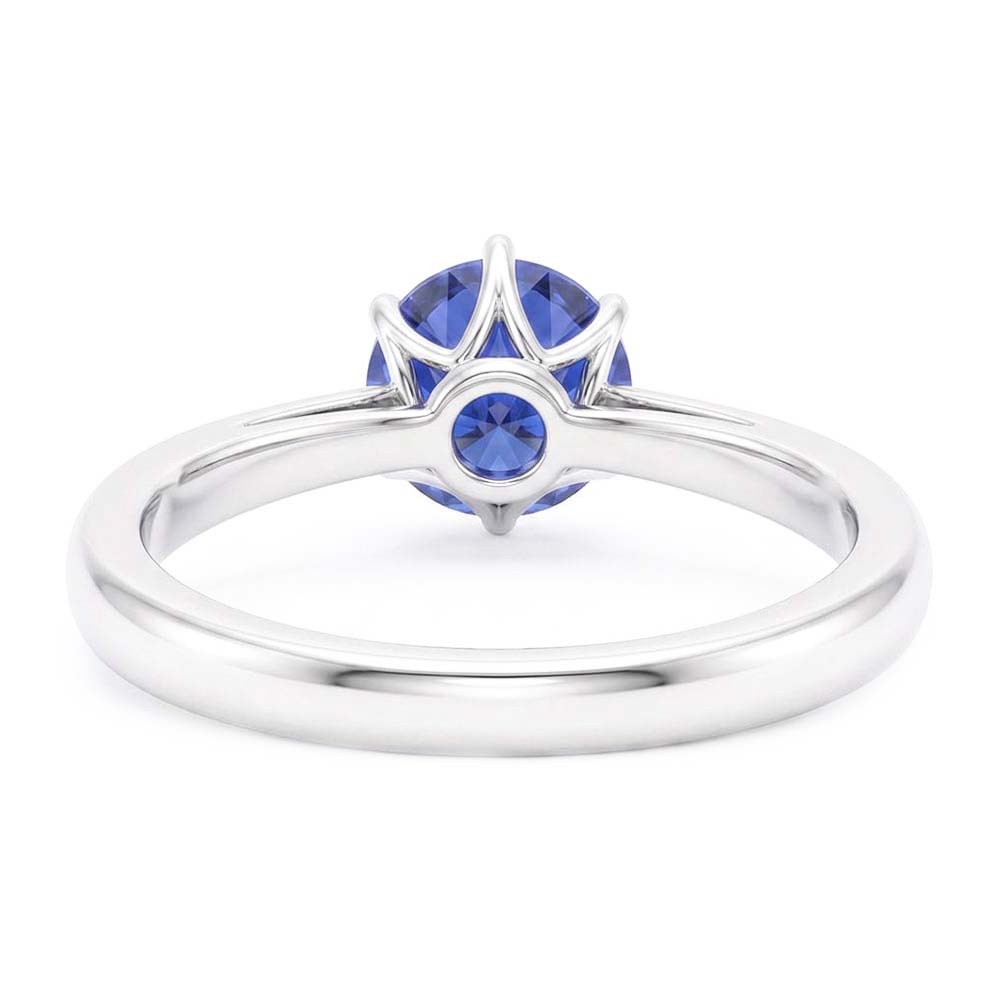 Anello da donna in oro con solitario zaffiro blu 1.50 carati con gambo pizzicato
