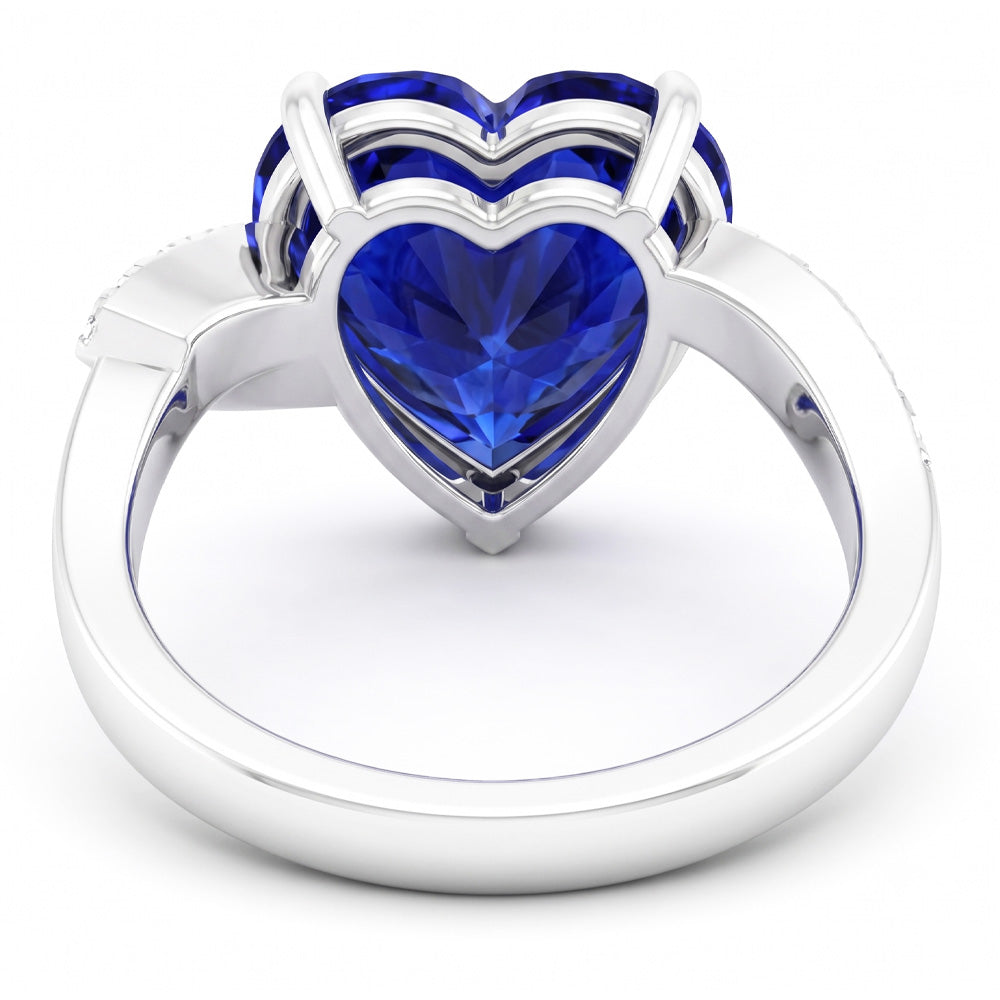 Anello dell'anniversario con zaffiro a cuore da 3,50 carati e oro con gambo intrecciato con diamanti