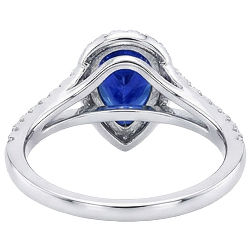 Anello di fidanzamento aureola con zaffiro blu pera e diamanti 4.50 carati