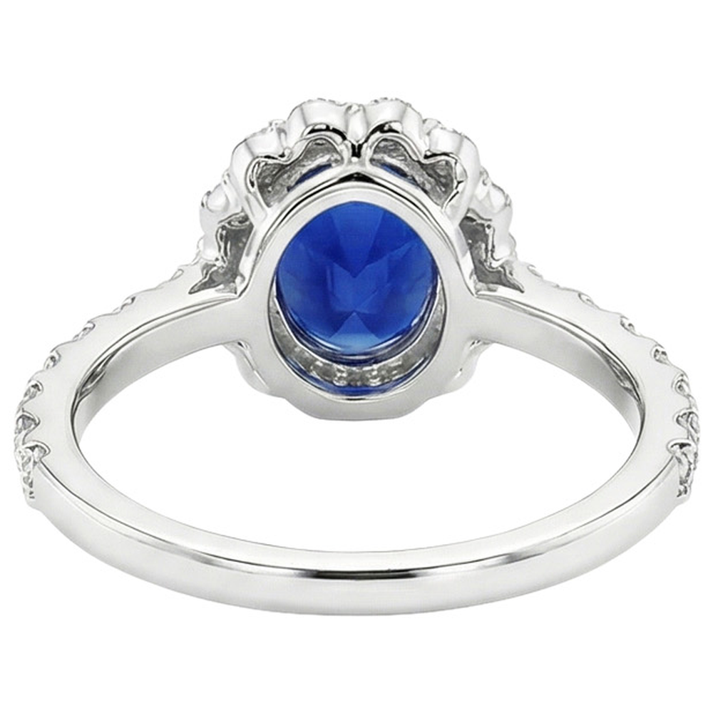 Anello di fidanzamento con alone blu zaffiro ovale e diamanti rotondi 5.50 carati