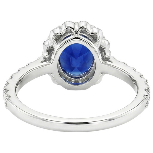 Anello di fidanzamento con alone blu zaffiro ovale e diamanti rotondi 5.50 carati